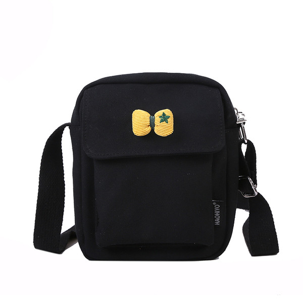 Γυναικεία υφασμάτινη τσάντα με μακριά λαβή και κορδέλα