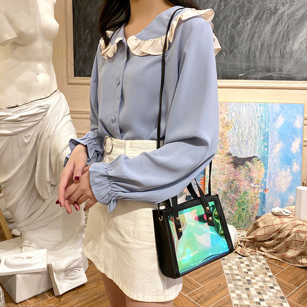 Ikdienas sieviešu soma ar diviem rokturiem un metāla elementiem