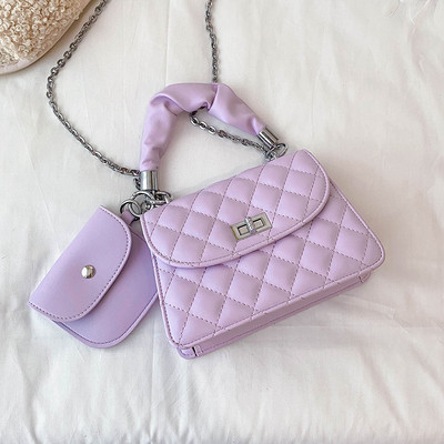 Stilīga sieviešu soma ar īsu rokturi un metāla aizdari