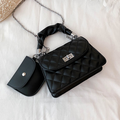 Stilīga sieviešu soma ar īsu rokturi un metāla aizdari