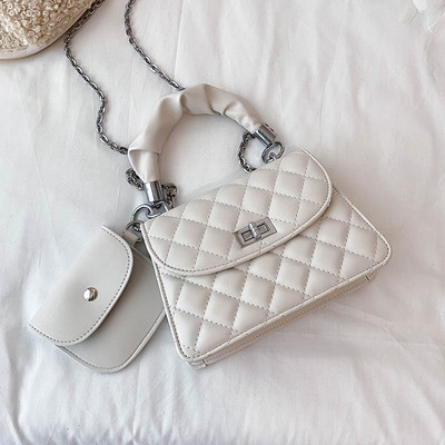 Stilīga sieviešu soma ar īsu rokturi un metāla aizdari