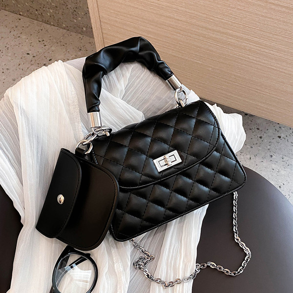 Stilīga sieviešu soma ar īsu rokturi un metāla aizdari