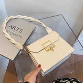 Moderna sieviešu soma ar metāla aizdari un rokturi no eko ādas