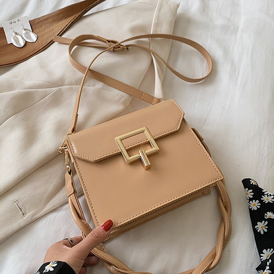 Moderna sieviešu soma ar metāla aizdari un rokturi no eko ādas