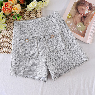 Naiste lühikesed püksid taskute ja kõrge vöökohaga