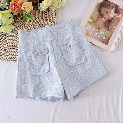 Naiste lühikesed püksid taskute ja kõrge vöökohaga