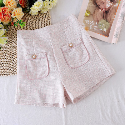 Naiste lühikesed püksid taskute ja kõrge vöökohaga