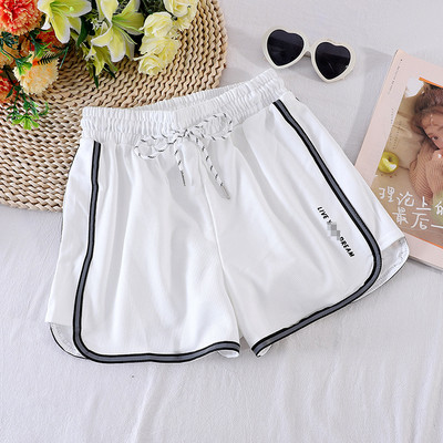 Sport és alkalmi női nadrág gumival és fűzővel