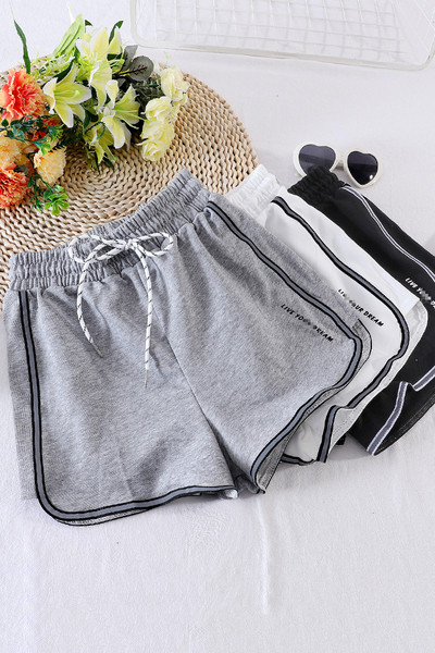 Sport és alkalmi női nadrág gumival és fűzővel