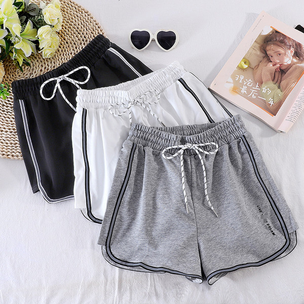 Sport és alkalmi női nadrág gumival és fűzővel