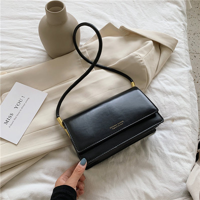 Γυναικεία τσάντα με μακριά δερμάτινη λαβή σε διάφορα χρώματα