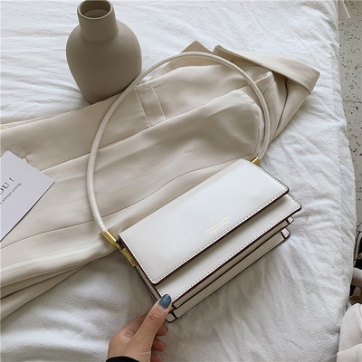 Γυναικεία τσάντα με μακριά δερμάτινη λαβή σε διάφορα χρώματα