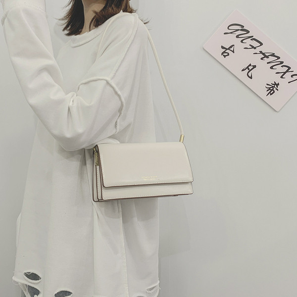 Γυναικεία τσάντα με μακριά δερμάτινη λαβή σε διάφορα χρώματα