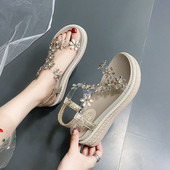 Modernas sieviešu sandales ar biezām zolēm un akmeņiem