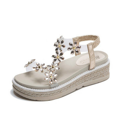 Modernas sieviešu sandales ar biezām zolēm un akmeņiem