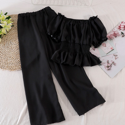 Modern női szett hosszú nadrágot és rövid ujjú blúzt tartalmaz