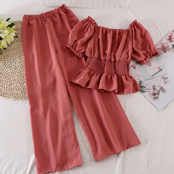 Modern női szett hosszú nadrágot és rövid ujjú blúzt tartalmaz