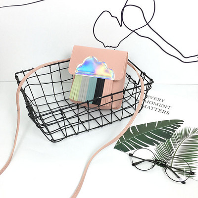 Kis kézitáska rojtokkal több színben