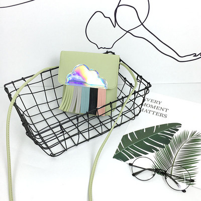 Kis kézitáska rojtokkal több színben