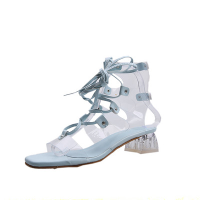 Sieviešu sandales ar krusteniskām saitēm un zemu papēdi