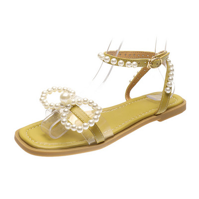 Női alkalmi szandál lapos talppal és gyöngyökkel