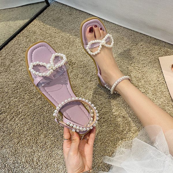 Női alkalmi szandál lapos talppal és gyöngyökkel