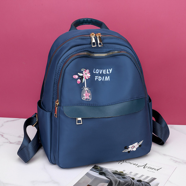 Naiste vabaaja seljakott tikandi ja esitaskuga