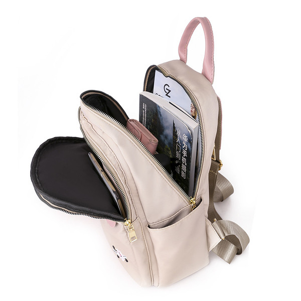 Naiste vabaaja seljakott tikandi ja esitaskuga