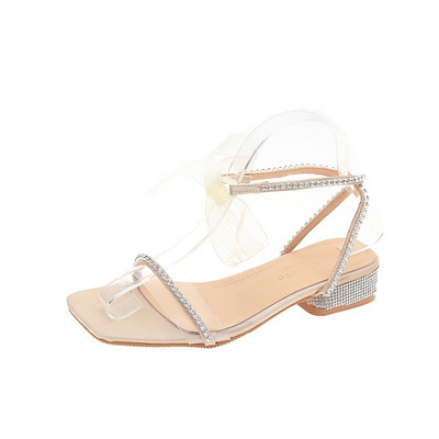 Moodsad kivikeste ja lameda tallaga naiste sandaalid