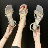 Modernas sieviešu sandales ar plānu 6 cm papēdi un metāla elementu