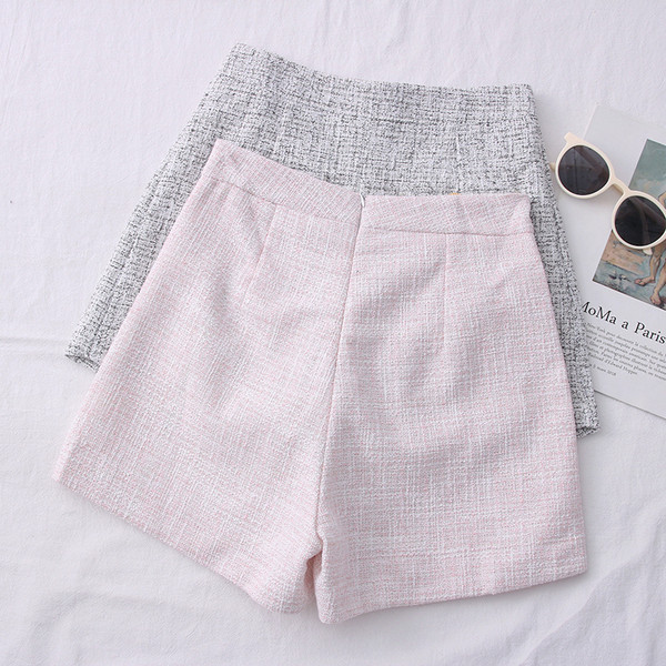 Eleganti sieviešu šorti ar kabatām priekšpusē