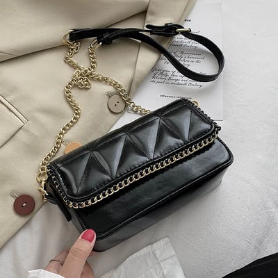 Sieviešu ādas soma ar garu metāla rokturi