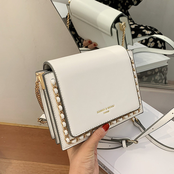 Moderna sieviešu soma ar garu rokturi no eko ādas