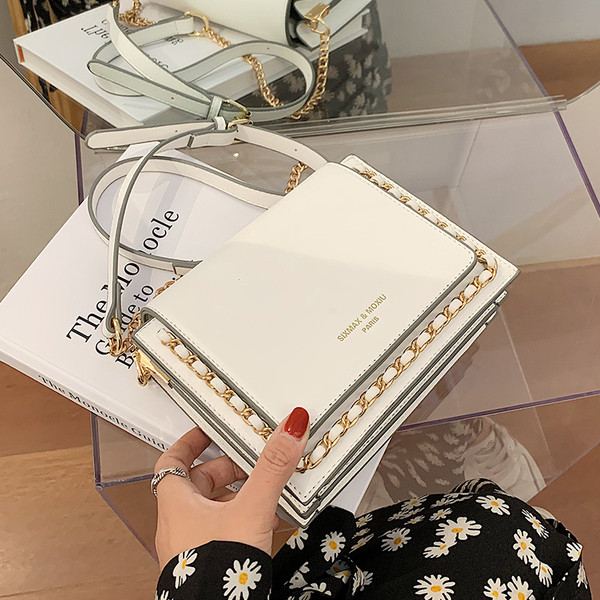 Moderna sieviešu soma ar garu rokturi no eko ādas