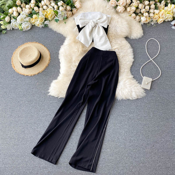 Moderan ženski komplet dugih hlača i poprsja u crnoj boji