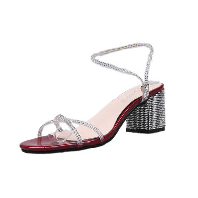 Sieviešu sandales ar akmeņiem un biezu papēdi