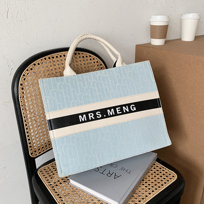 Moderna sieviešu soma no eko ādas ar īsu rokturi