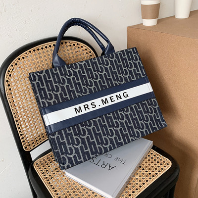 Moderna sieviešu soma no eko ādas ar īsu rokturi