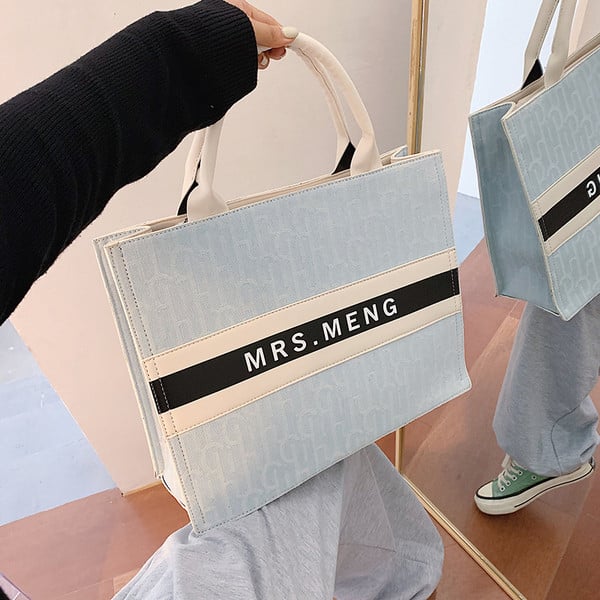 Moderna sieviešu soma no eko ādas ar īsu rokturi