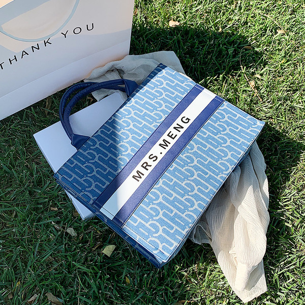 Moderna sieviešu soma no eko ādas ar īsu rokturi