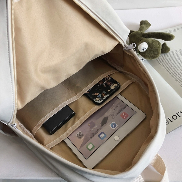 Sieviešu sporta mugursoma ar margrietiņu un priekšējo kabatu