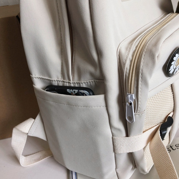 Sieviešu sporta mugursoma ar margrietiņu un priekšējo kabatu