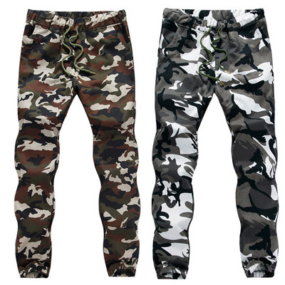 Fashionable men`s long pants with ties and camouflage