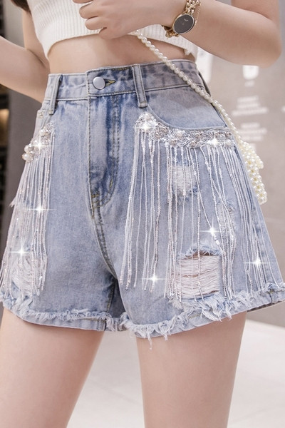 Sieviešu džinsi ar augstu jostasvietu un pērles ar akmeņiem