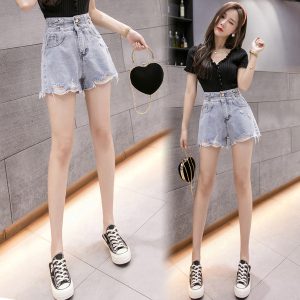 Īsi sieviešu džinsi ar augstu vidukli un saplēstu motīvu