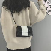 Sieviešu ādas soma ar garu rokturi melnā krāsā