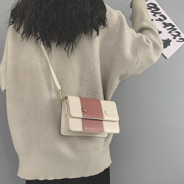 Sieviešu ādas soma ar garu rokturi melnā krāsā