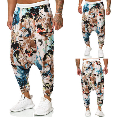 Casual men`s wide pants with a pattern and pockets