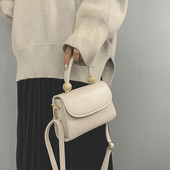 Moderna ženska torba sa kratkom i dugom ručkom od eko kože