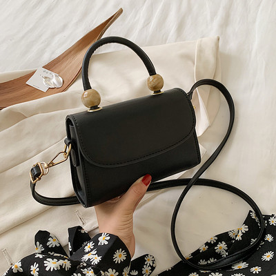 Moderna ženska torba sa kratkom i dugom ručkom od eko kože